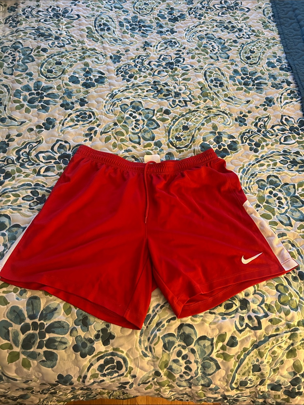 Nike Red Woman’s Training Shorts with White Swoosh